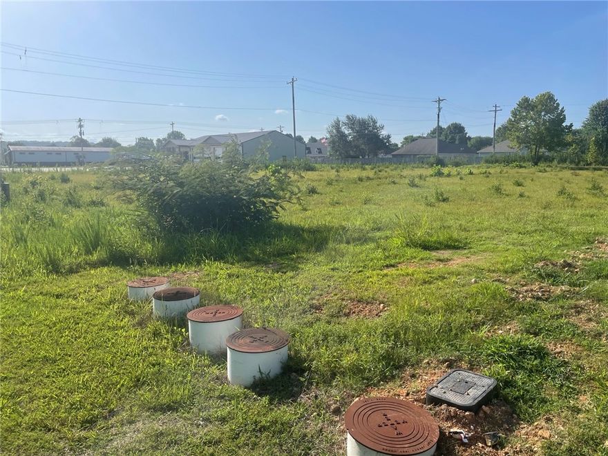 Nice level lot in Elkins with utilities located on property. Agent owned