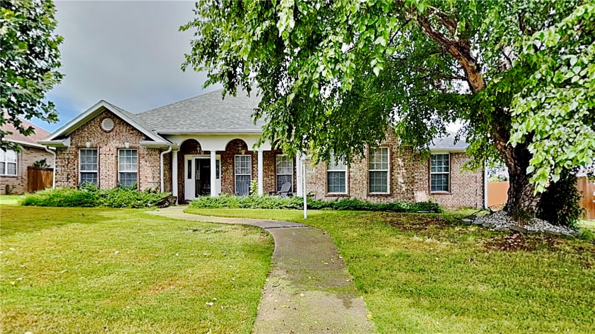 Charming and newly remodeled, this 4-bed, 2-bath all-brick home in Bentonville’s Orchards subdivision offers 1,982 sq ft of comfortable one-level living. A rear loading garage provides excellent curb appeal for this cul-de-sac home. The layout features a spacious living area with a cozy gas fireplace and a formal dining room that is perfect for gatherings. The kitchen includes ample counter space, a breakfast nook, and a functional layout for everyday living. The split-bedroom design offers a private primary suite with a closet and ensuite bath that features a walk-in shower and a soaking tub. Three additional bedrooms provide space for everyone. Set on a 0.27-acre fenced lot with mature landscaping, privacy fencing, and a great covered patio. With a new HVAC and upgraded insulation you will love your utility bills. Located just minutes from schools, trails, parks, and downtown Bentonville, this home combines value, space, and convenience. Check out the virtual tour and then schedule your in-person showing!