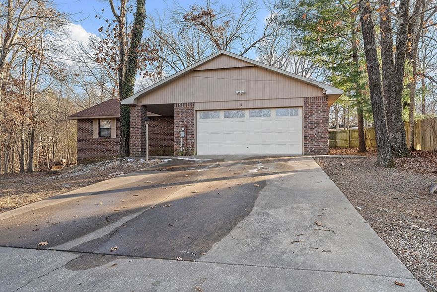 Nestled in a serene cul-de-sac in Bella Vista, this affordable opportunity awaits. This charming 3-bedroom, 2-bathroom home is situated on a private lot, offering a tranquil environment with minimal through traffic. It presents a fantastic chance for buyers to personalize their space and build equity. The home has already undergone significant upgrades, including a new roof in 2025 and being connected to the city sewer system. The layout features an enclosed sunroom and an attached two-car garage, providing ample space and functionality. Surrounded by Bella Vista’s picturesque trails, lakes, and outdoor amenities, the location truly stands out. The peaceful setting, strong value, and endless potential make this property an ideal choice for the next owner. Priced to sell, it’s ready for someone to transform it into their dream home.