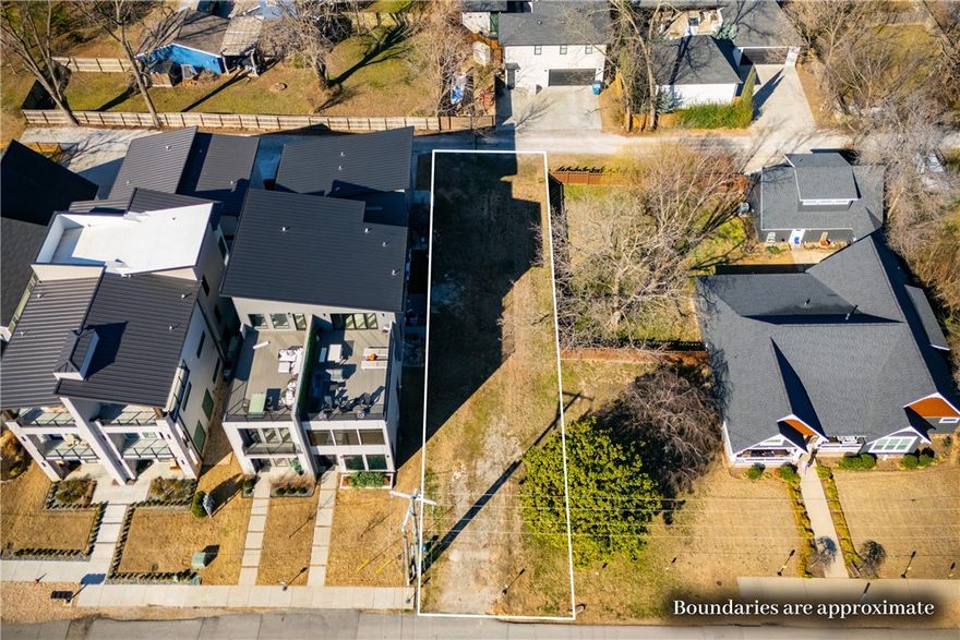 Prime downtown Bentonville opportunity! This .19-acre lot is ideally located within walking distance of the The Momentary and directly across the street from the vibrant Market District. Zoned RC-2 and ready for construction, the property offers convenient alley access at the rear and no existing structure to remove—saving both time and cost. Enjoy an easy walk to the Bentonville Square and the nearby Arts District while being positioned in one of the fastest-growing areas of downtown Bentonville. A rare chance to build in a highly sought-after location with strong future potential.