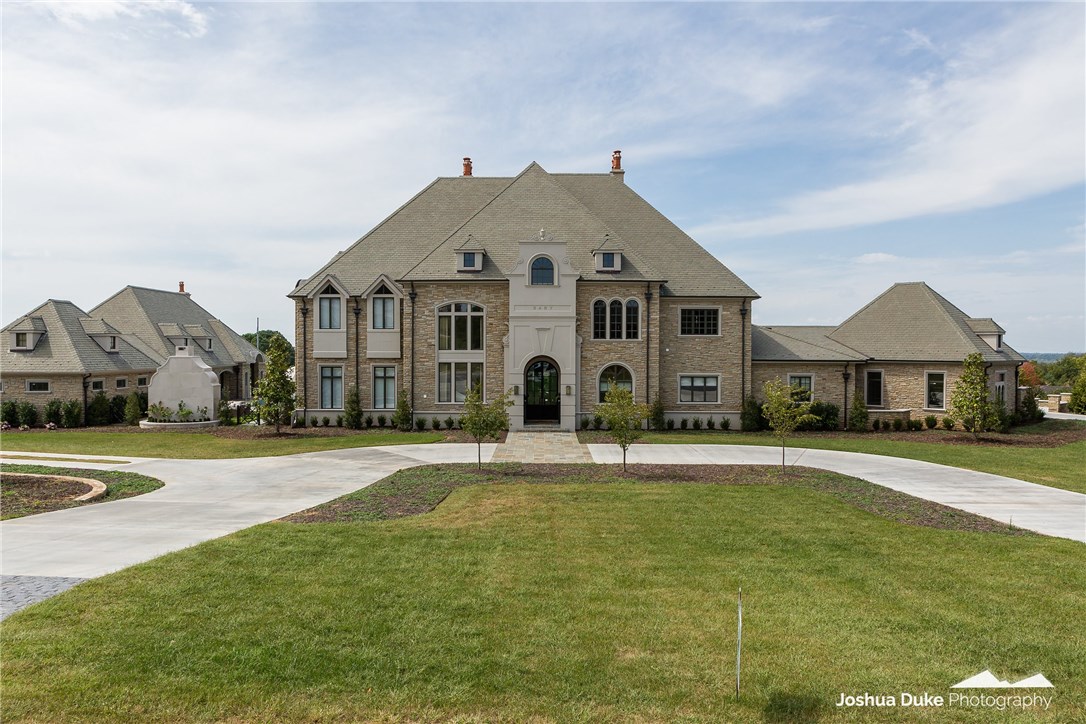 Beyond Breathtaking!! This one of a kind custom home was built to engage and entertain! From 7 bedrooms 6 full bath & 2 half baths in the Main house to 1 bedroom 3 full baths in the Guest house. The Lovely Guest house built with the same extraordinary quality is 1975sq/ft. Total for both homes is approx 13,591 heated and cooled sq/ft. Per appraisal. You can host large dinner parties from the stunning kitchen/dining area or take in the sunset from one of the three covered patios with your family. Perfect for large inside or outside socials year round. Bluestone patios, sports pool, custom hot tub, gas fire pit, lighted sport court and infrared recessed heaters. Privacy added with new landscaping. This is a must see Estate in one of East Fayetteville’s exclusive neighborhoods. Call for detailed amenities list.