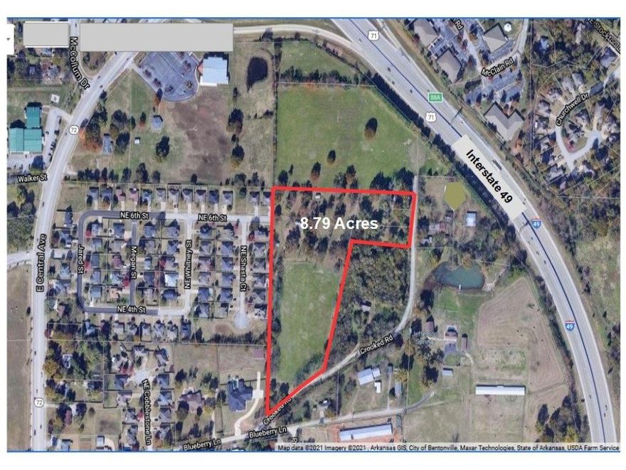 8.79 acres of level to gently sloped land that is adjacent to land fronting on I-49 in NE Bentonville. Presently zoned Agricultural and has a modular home and outbuildings.  All utilities nearby.  Owners want to sell with the 12.69 adjoining acres, see MLS #'s 1180334 and 1180338.