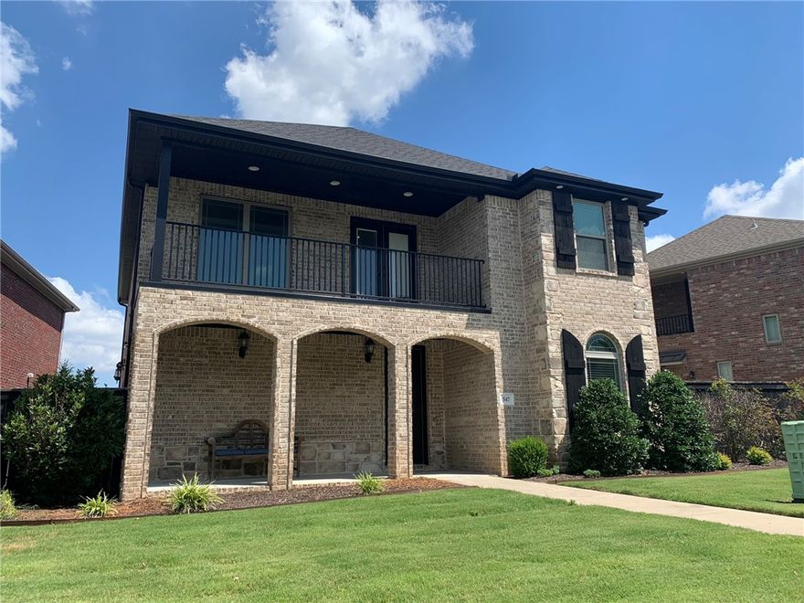 Just like new construction 5 bed 2.5 baths within walking distance to everything you could need and just minutes to the University. Community Pool is right across the street! Everything you need is on the main level of this home, upstairs has additional bedrooms & bath as well as a perfect balcony for entertaining.