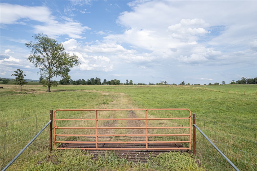 Looking for a great place to build your new home and have room to raise cattle. This property offers both. It is conveniently located and on a paved road. No mobile homes allowed.