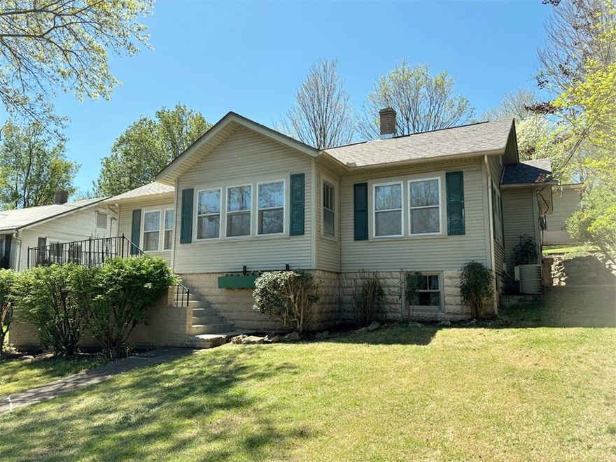 Neat 2BR 1 BA cottage overlooking the Harrison skyline. Landscaped yard, beautiful wood floors, original wood trim, kitchen and bath have been updated in the past, rooms are nice sized, and the house exudes the romance of yester year. Double carport with storage is accessed from the alley at the back of the house. New roof on the house & the carport! This one deserves your attention.