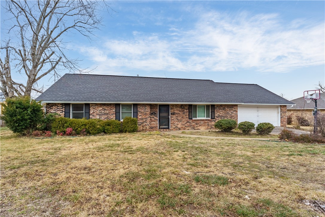 Charming home with lots of curb appeal, mature trees, landscaped front, and shutters. New floors. Formal living room off entry.Large eat-in kitchen has updated painted cabinets, built-in china cabinet and counter bar seating. Dining space has plenty of room and is open to both kitchen and spacious family room. Family room has large brick fireplace and surrounding built-ins. Patio and fenced backyard provide outdoor living space. Master bedroom has updated attached bath with double vanity and WIC. Three guest bedrooms and two guest bathrooms provide additional space. Excellent location with easy access to shopping, dining, and entertainment.