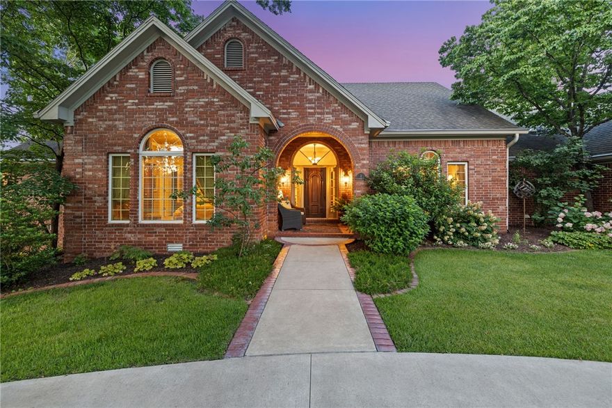 Discover an exceptional find in Bentonville's prestigious Hanover neighborhood – a truly unique, one-owner custom home now available for the very first time. This magnificent residence is perfectly tucked away on 1.62 acres, offering an unparalleled blend of privacy, luxury, and convenience that's hard to come by in this coveted area.  Step into a serene oasis framed by mature, meticulous landscaping and a tranquil koi pond that adds to the home's picturesque charm..The enclosed sunroom, off the kitchen, provides idyllic backyard views.  Inside, enjoy generous spaces. The main level features an eat-in kitchen and a dedicated office. Downstairs, a second living area with a kitchenette offers flexible space for guests or entertaining. Both levels boast exceptionally large bedrooms and bathrooms and vast amounts of storage.  Designed for effortless living, this home includes an irrigation system and an invisible fence.  Location is paramount; enjoy immediate access to Bentonville's renowned Greenway bike system.