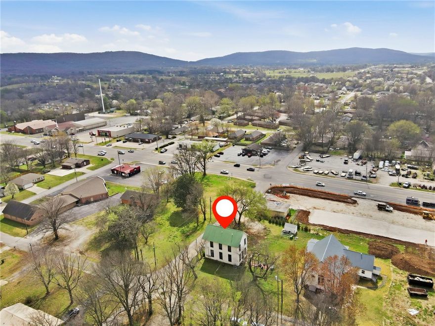 Unique opportunity to own a historic property in the heart of Farmington. Originally built in 1893 and thoughtfully remodeled in 2019, this 1,933 sq ft building offers a blend of historic charm and modern updates including electrical, plumbing, and HVAC. Many original features have been preserved, including hardwood floors, original doors, locks, and ornate hinges that highlight the building’s character.

Situated on a spacious corner lot and zoned C2, the property allows for a variety of commercial uses including office, boutique retail, studio space, or live/work potential. The layout currently offers multiple rooms that can function well for offices, meeting areas, or creative workspace. Solar panels are installed and will convey with the property, adding energy efficiency and long-term savings.

A rare opportunity to own one of the few remaining historic buildings in Farmington with flexible commercial potential. Also listed as residential MLS #1338880.