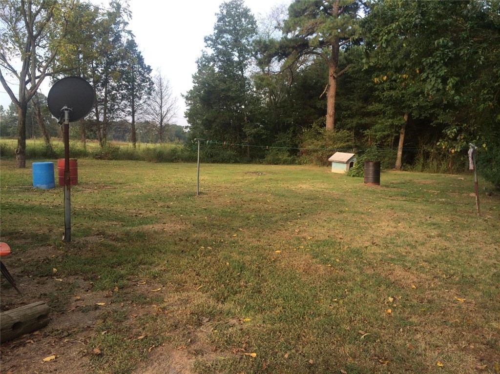 MUST HAVE AGENT TO SHOW PROPERTY. NICE 1.30 ACRES WITH GARAGE .
