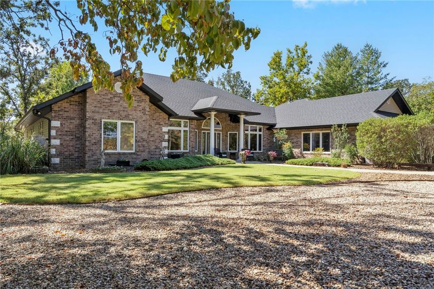 Welcome to your private retreat in Highland Estates—one of Bella Vista’s most desirable areas. Tucked away in a quiet cul-de-sac, this beautifully maintained one-level home sits on 5.24 acres of flat, usable land. With 3,304 sq ft, it features 3 spacious bedrooms, an office, formal living and dining rooms, and an abundance of natural light throughout. Step outside to enjoy a beautifully landscaped yard, an above-ground pool, and a fully finished 1,800 sq ft detached shop with heating, cooling, and oversized bay doors—offering endless potential for storage, hobbies, or a home-based business. Just minutes from Lake Loch Lomond, this property blends privacy, functionality, and location into one incredible opportunity.