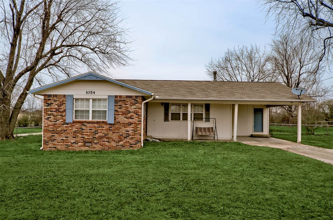Perfect home for a first time home Buyer or an investment property! This charming home with an oversized lot and large back deck is conveniently located just off off Hwy 265 and Don Tyson and just minutes aways from Hwy 71. This home is very well maintained. Many updates and improvements throughout home including; roof was replaced in 2011, wood flooring in living room 2007, new central heat/air unit in 2008, and new water heater in 2009. Don't miss out on this home!