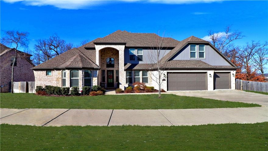 Spectacular one-owner home with highly sought-after finishes, wooded lot & fabulous views of the Fayetteville skyline. Open floor plan w/wall of windows in LR bringing the outdoors in & providing great backdrop to the interior. Living room has cozy FP w/built in’s, two-story ceiling & opening into casual dining & kitchen. KIT has abundance of cabinets, 3cm granite counter tops, farm sink, upgraded appliances w/gas cooktop, double ovens, pasta pot filler, walk-in pantry, & work space. Perfect home for everyday living or entertaining. Covered deck has gas outlet for grilling.  Three-car garage. Owner’s suite offers a relaxing retreat & spa-like bathroom. Main level also features FDR, guest BR & laundry. Upstairs has two BRs & bonus room. two 50 gallon water heaters, Nest thermostats, wood floors, plantation shutters across front windows, 2” faux wood blinds across back, native stone patio w/firepit. Sit on your covered back deck, relax and enjoy the sunsets or kick back by the firepit!  Don’t miss seeing this home!