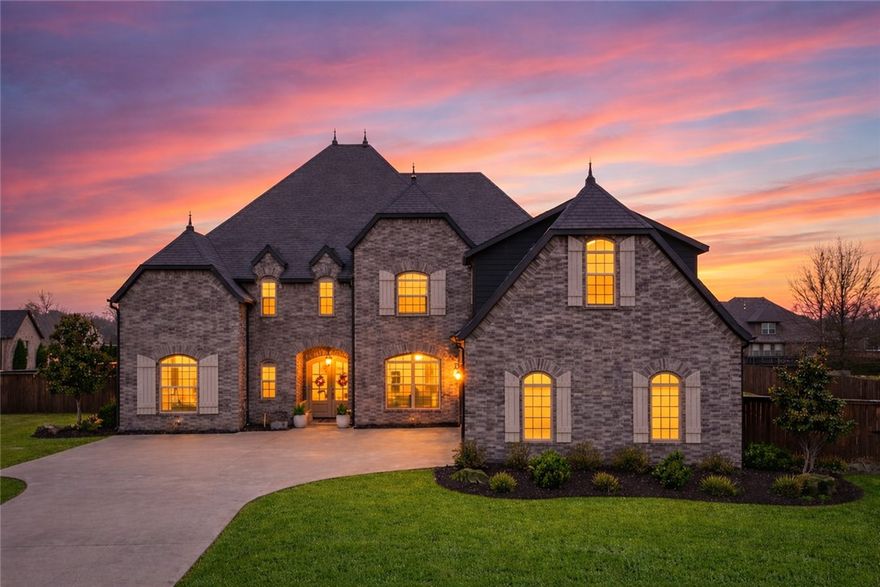 Remarkable custom builder's home where craftsmanship and designer details meet effortless luxury living. Every inch of this 5,000+ sq. ft. masterpiece is thoughtfully appointed, from the spacious eat-in kitchen with oversized pantry and custom Butler's Pantry, to the primary suite retreat with its abundant windows, and rolling-ladder closet built for real life. A dedicated Media Room and sprawling Bonus/Rec Room with wet bar anchor the home's entertainer credentials. Four bedrooms with a total four and a half baths give you an ensuite in every bedroom. This three-car garage and premium lot is in one of Cave Springs' most sought-after large-lot communities! Step outside to outdoor living that matches the interior's feel and look complete with auto shades across the patio.  There's also a tornado shelter built into the garage! This rare Ridgewood home brings both the WOW and the warmth of this special community! New outdoor kitchen, updated flooring, updated kitchen, and 2 new HVACs.