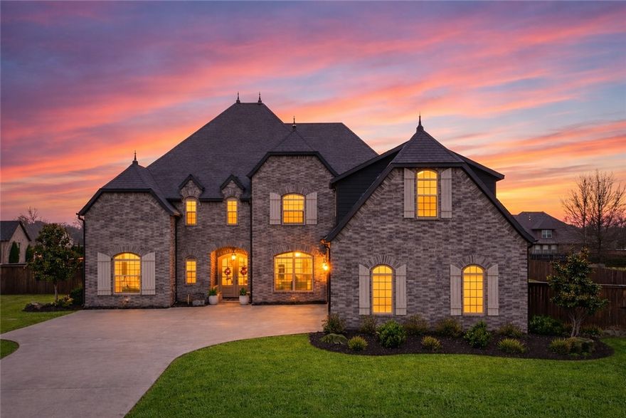 Remarkable custom builder's home where craftsmanship and designer details meet effortless luxury living. Every inch of this 5,000+ sq. ft. masterpiece is thoughtfully appointed, from the spacious eat-in kitchen with oversized pantry and custom Butler's Pantry, to the primary suite retreat with its abundant windows, and rolling-ladder closet built for real life. A dedicated Media Room and sprawling Bonus/Rec Room with wet bar anchor the home's entertainer credentials. Four bedrooms with a total four and a half baths give you an ensuite in every bedroom.The three-car garage and premium lot in one of Cave Springs' most sought-after large-lot communities round out a home that checks every box. Step outside to outdoor living that matches the interior's feel and look complete with auto shades across the patio.  There's also a tornado shelter built into the garage! This rare Ridgewood home brings both the WOW and the warmth of this special community! New outdoor kitchen, updated flooring, updated kitchen, and 2 new HVACs.