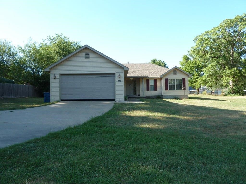 Darling 3 bed/2 bath home on .55 acres. New roof in 2022. Beautiful stone gas log fireplace, LVP flooring in living and kitchen. 2 pantries. 192 SF storage building. Sink in laundry, lots of storage in updated master closet. Close to schools. Custom bookshelves in living room stay but are not attached.