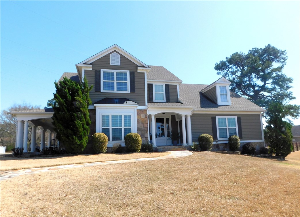 Simple elegance and quality construction abound at this expansive home! Two bonus spaces allow this to be a 4 OR 5 Bedroom home with plenty of space for everyone! Tons of upscale amenities will check all the boxes on your wish list. Scraped hardwood floors, granite and quartz counters throughout, new decorative tile in a freshly remodeled kitchen, travertine tile in master bath, 2 Fireplaces, 3 Geothermal units, 85 Gallon Marathon hot water heater and SO MUCH more! You'll want to see for yourself.