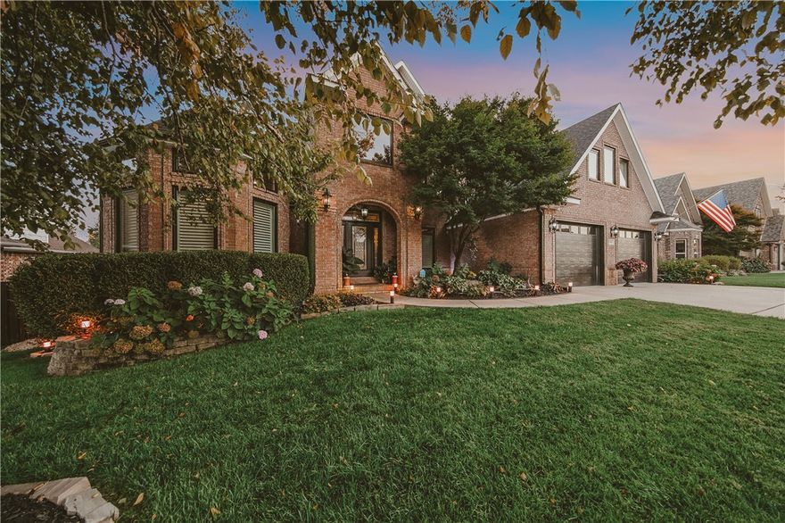 Discover a perfect blend of style, function, & fun. Stunning 5br custom home in highly sought-after Kensington subdivision. An entertainer's dream, meticulously designed w/high-end finishes & unique spaces. Heart of home is gourmet kitchen, featuring marble-veined quartzite counters, rich, custom walnut cabinetry, & full suite of professional-grade ss appliances. Expansive, U-shaped island w/bar, striking gold pendant lighting adds touch of metropolitan glamour. The formal dining room, a showstopper defined by dramatic dk blue accent walls & elegant white wainscoting— ideal backdrop for sophisticated dinner parties. Welcoming, open-concept living room flows seamlessly from kitchen anchored by a beautiful fireplace & ample seating space under a vaulted ceiling. Retreat to tranquil primary suite or one of the spacious bedrooms, all designed for comfort & privacy. With gorgeous hardwood flooring & plantation blinds throughout main level, thoughtful fixtures & abundant natural light, this Bentonville gem ready for you