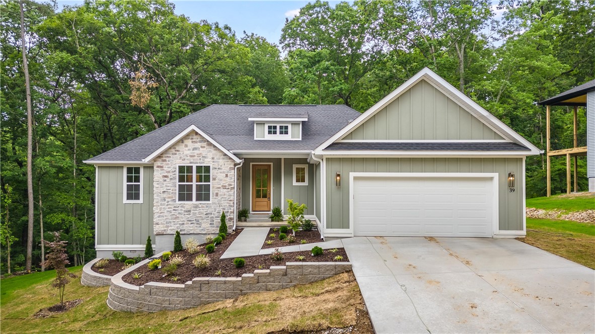 This hard to find one level home has a lot to offer. Entrance has a nook for coats,shoes,etc. A large pantry and laundry roomare easily accessible. Wide plank flooring with carpet in bedrooms,tile in bathrooms. The kitchen has quartz counters with tile backsplash.The eat-in kitchen opens to a covered patio with iron railing. Enjoy the private,treed backyard while enjoying that morning coffee. The huge master suite features a very unique tile shower. The master bedroom closet also open to the laundry room for added convenience. Fully landscaped and located in a cul-de-sac. The street is set to be paved in June by the city.