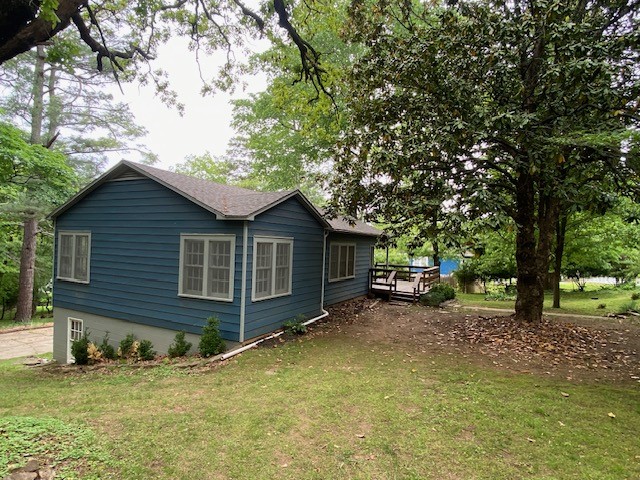 Enjoy the tranquility and wildlife in your own backyard on Mt Sequoyah! This well-preserved home is nestled under mature trees and sits on a beautiful half acre lot! Amenities include rustic hardwood flooring, granite countertops, a gas range and a walk-out basement! Enjoy the private retreat feel with the convenience of being only a few minutes from downtown Fayetteville!