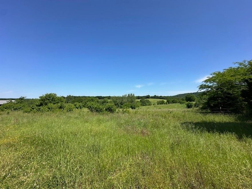 Exceptional opportunity to own 39.82 Acres +/- close to Prairie Grove and only 4 miles to the I-49 corridor. This beautiful gently rolling, partially wooded land is completely fenced with 2 ponds and a 24 X 36 pole barn. There is a well and electricity on site, making it convenient for building your dream home with views, on one of the several available sites. This land is also versatile and can be used for cattle farming (property is currently leased for cattle), recreational use or escaping the city life. Schedule your showing to see this exceptional property today! Also, see MLS# 1308982