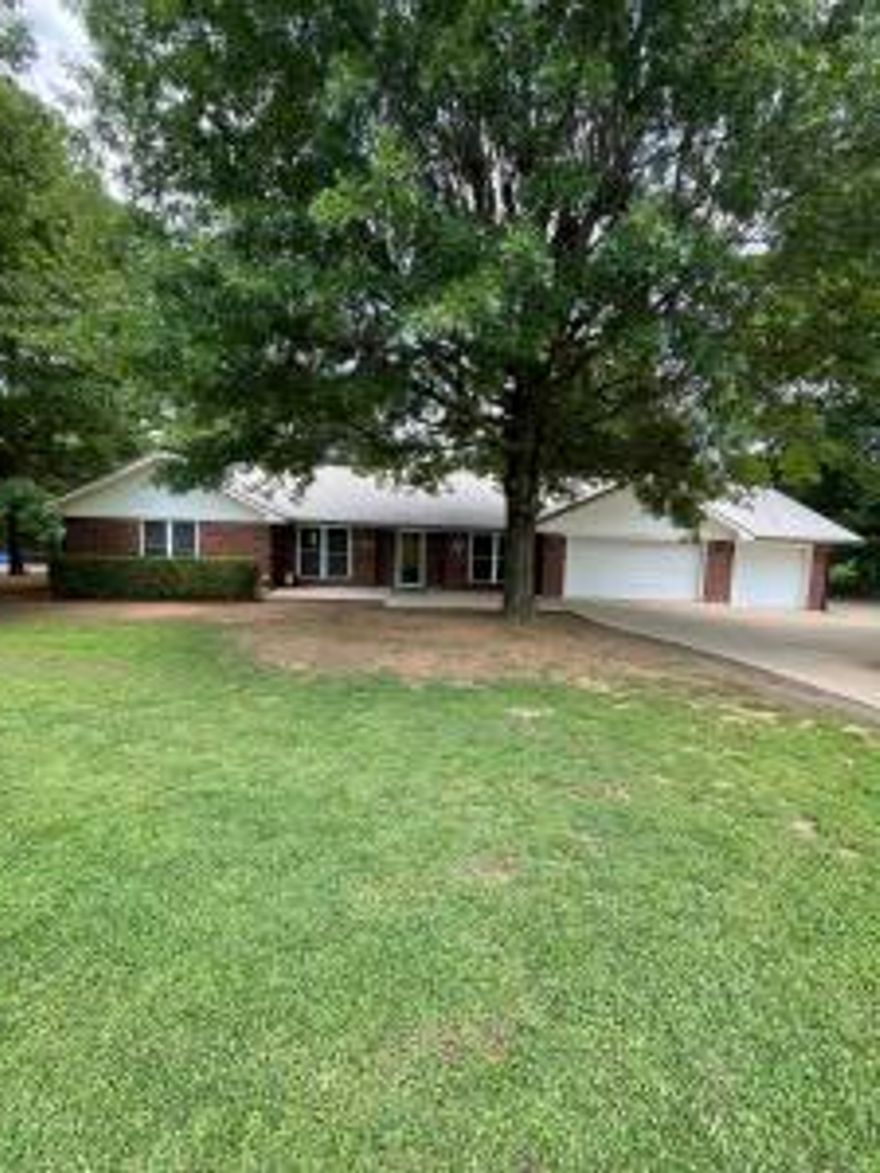 Located in the River Valley with the Ouachita Mountain range ti the south and the Ozark Mountains to the north lays this beautiful spacious 2300 sq ft 4 bedroom 3 bathroom home. This home features spacious bedrooms, a screened in gazebo, concrete driveway, fenced in yard for your fur Baby and a nice shop in the back yard. Handicapped accessible