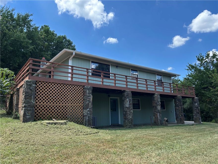 Lakefront, easy lake access. Beautiful views. Just minutes to Hickory Creek State Park and Marina. 2 story house with a bathroom on each level. Lower den could be 2nd living area, hobby room or 3rd bedroom.  Dining area plus breakfast bar. Workshop/yard equipment storage area with bench and overhead door. Large wrap around deck on the lake side, small deck at the rear. Owner pays for yard mowing. Please do not visit property without an appointment.  Agent owned.