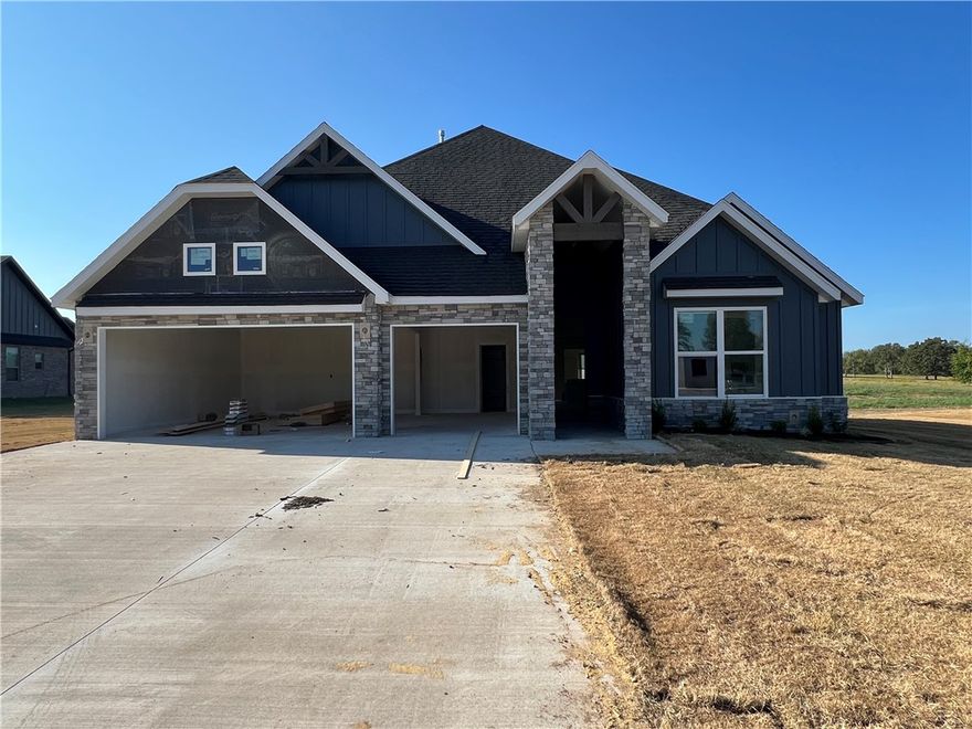 Welcome home to Jenna Estates. The 3038 plan features 4bedrooms, 3.5 bathrooms and located on a spacious 1.06 acre lot. The finishes will amaze you with custom cabinets, insulated garage, and tile to the ceiling in the bathrooms. Concessions Include: 5K from the Builder towards closing costs and get an additional 5k if you use the preferred Lender not to mention get the blinds and gutters included. Located 11 miles from downtown Bentonville and the new Bella Vista Bypass exchange, this neighborhood offers you the convenience of I-49 but with the country feel you crave!