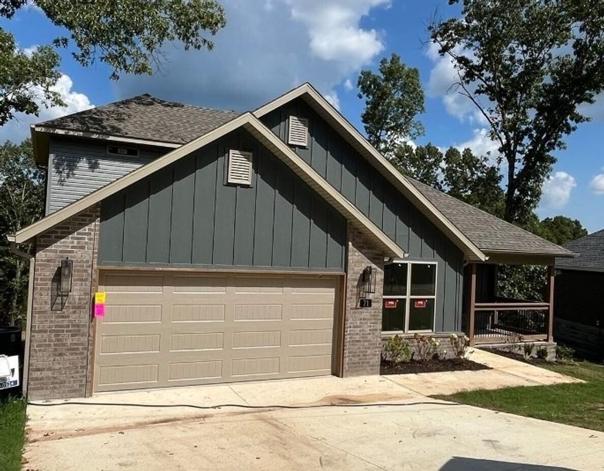 Welcome to your new home in the charming heart of Bella Vista, just a stone's throw from beautiful Lake Avalon! This two-story gem offers a spacious 2,154 square feet of comfort and style.

On the main level is the owner's suite and a office /bonua space, as well as an inviting open-concept kitchen, dining, and living area with a vaulted ceiling and fireplace—perfect for gathering with family and friends. Plus, there's a great-sized pantry, laundry room, and a two-car garage.
Head upstairs to find two more bedrooms and a bathroom. This home is packed with great finishes, including 3 cm countertops and sleek Frigidaire Gallery appliances and more!

And let's not forget about the great outdoors! You’re just a short walk from scenic lakes and bike trails, making it easy to enjoy nature. Plus, you're only a quick drive away from all the fantastic amenities Northwest Arkansas has to offer and zoned for Bentonville schools. Come check it out!