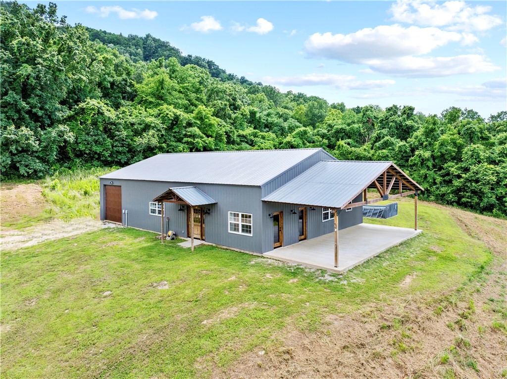 This newer-built home, completed in 2022, sits on 2.8 acres and offers impressive space along with beautiful views of Newton County. Located just outside of Jasper, you'll love the close proximity to the Buffalo National River and all the outdoor adventure the Ozarks have to offer!
The main living area features 3 bedrooms and 2 full bathrooms, designed with a modern, open layout throughout. One of my favorite features? The sweeping view of the Ozarks you can enjoy from multiple rooms in the house! Plus, with approximately 1,400 square feet of unfinished space on the second level, you have a blank canvas for any future space you might want or need. It’s all complete with a massive 19' x 37' attached garage and workspace — offering endless possibilities.
Modern construction, a stunning location, and room to grow. If you’re ready to enjoy the beauty of the Ozarks with the convenience of a newer build, this home is ready for you. Come see this one in person!