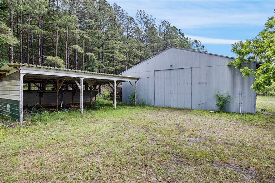 14.5 acre +/- located just off Hwy 22. Road and utility easement allow access to the shop/land.