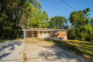 DOUBLE LOT!!! Home has been remodeled all the way down to the floor joists. New paint, flooring, cabinets, countertops, vanities, faucets, lighting, french drain, sealed basement, and best of all a brand new HVAC!! Don't miss this beautiful 3 bedroom, 1 1/2 bath home!