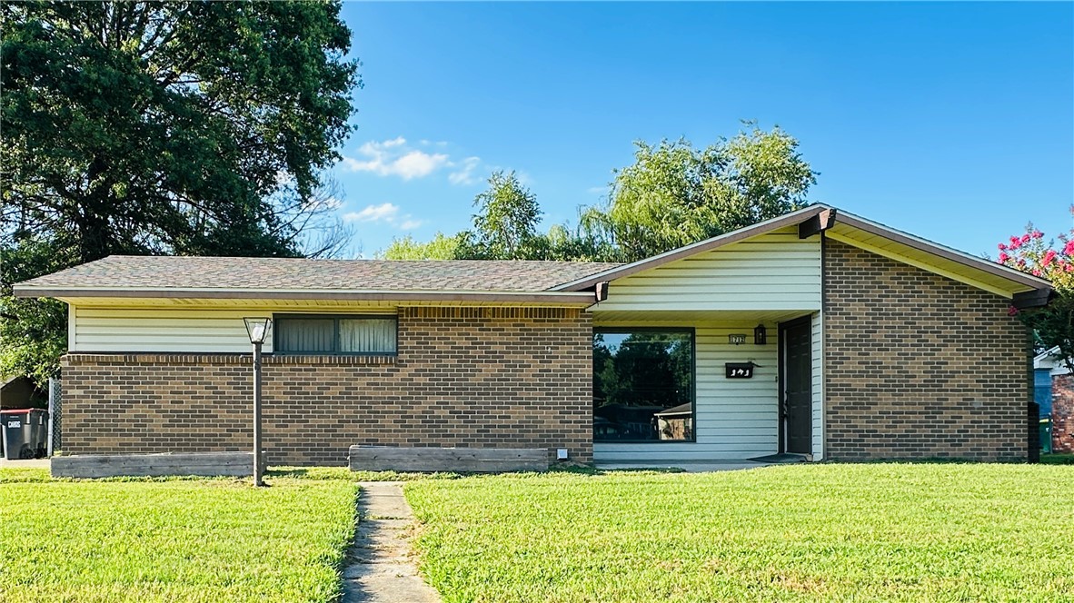 Updated 3BR/2BA home, Springdale Schools with 1,422 SF of move-in-ready living space! Solid 1965 construction brings vintage charm, complemented by stylish 2025 updates like new roof, flooring, interior & exterior paint, new toilets, updated hardware, lighting, and ceiling fans. Bright open layout, eat-in kitchen, and split-bedroom plan. Yard is partially fenced on three sides, with an additional fully fenced area inside, ideal for pets or play. Located in a quiet neighborhood with easy access to I-49, Arvest Ballpark, schools, shopping, and dining. Ideal for first-time buyers, investors, or anyone seeking low-maintenance living in Northwest Arkansas!