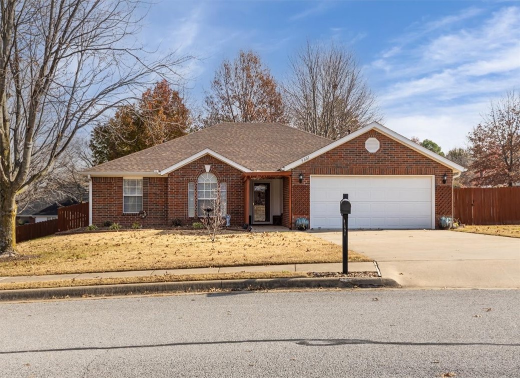 Discover a lovely 3-bedroom, 2-bathroom home spanning 1,548 sqft with impressive 10-foot ceilings, situated on a sprawling 0.22-acre corner lot. This residence boasts a prime location with convenient access to I-49, Don Tyson, and the diverse amenities of Springdale. Upon entering, the welcoming living room features a charming gas fireplace, creating a cozy focal point. The eat-in kitchen is a culinary delight, equipped with a gas range, ample counter space, and plenty of cabinets, with the refrigerator included in its current condition. Enjoy spacious, carpeted bedrooms and a practical laundry room. Step outside to a big, fenced backyard hosting a large covered wood deck, providing an ideal space for outdoor relaxation. This home seamlessly blends comfort, practicality, and a sought-after location, offering an appealing opportunity for potential homeowners.