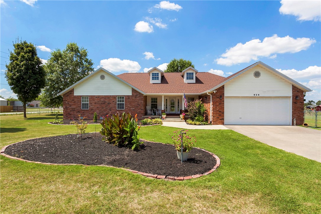 So many updates on this well cared for home sitting on over 2 acres with TWO detached shop/garages. Walk in the front door to a spacious oversized living room & kitchen complete with bamboo floors and cozy fireplace. Kitchen has Kenmore Elite appliances with new gas stove installed July 2020 & quartz countertops. Just off the kitchen is an oversized laundry room and pantry. New HVAC installed in 2020, gutters installed in 2019, new roof and water heater in 2015. This home also comes with a whole home Generac generator installed Sept 2019. Outside is a total fenced yard with a solar panel gate, 3 car detached garage with heated and cooled 16x20 work/craft space. There is also a detached 2400 square foot shop complete with 2 post car lift. Truly a unique property!