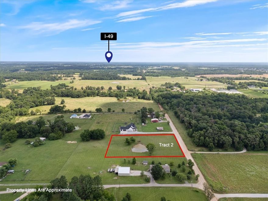 A beautiful pond graces this property for horses or just stocking with your favorite catch. Build your dream home on this 1.88-acre lot on Keller Road. Bentonville schools just around the corner, parks and easy commute to I-49 or Main Street Centerton. Tract 2 is 1.88 acres with natural gas, public water and electric available at street.  Start living country life today!
Property sits outside city limits and qualifies for USDA Financing with $0 down.