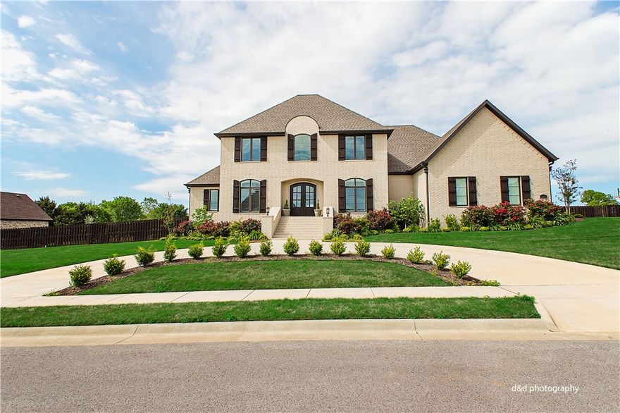 Simply breathtaking home in the coveted Overton Park subdivision.  Open living concept with attention to every detail.  Two bedrooms downstairs with office, eat-in kitchen, huge island with quartz countertops, upgraded fixtures,  custom cabinets, covered patio outside set up for entertaining with outdoor fireplace, tv hook up, built in grill, heated pool with built in landing and hot tub with cascading waterfall.  Pool is surrounded by cool decking, home sits on .80 acre lot