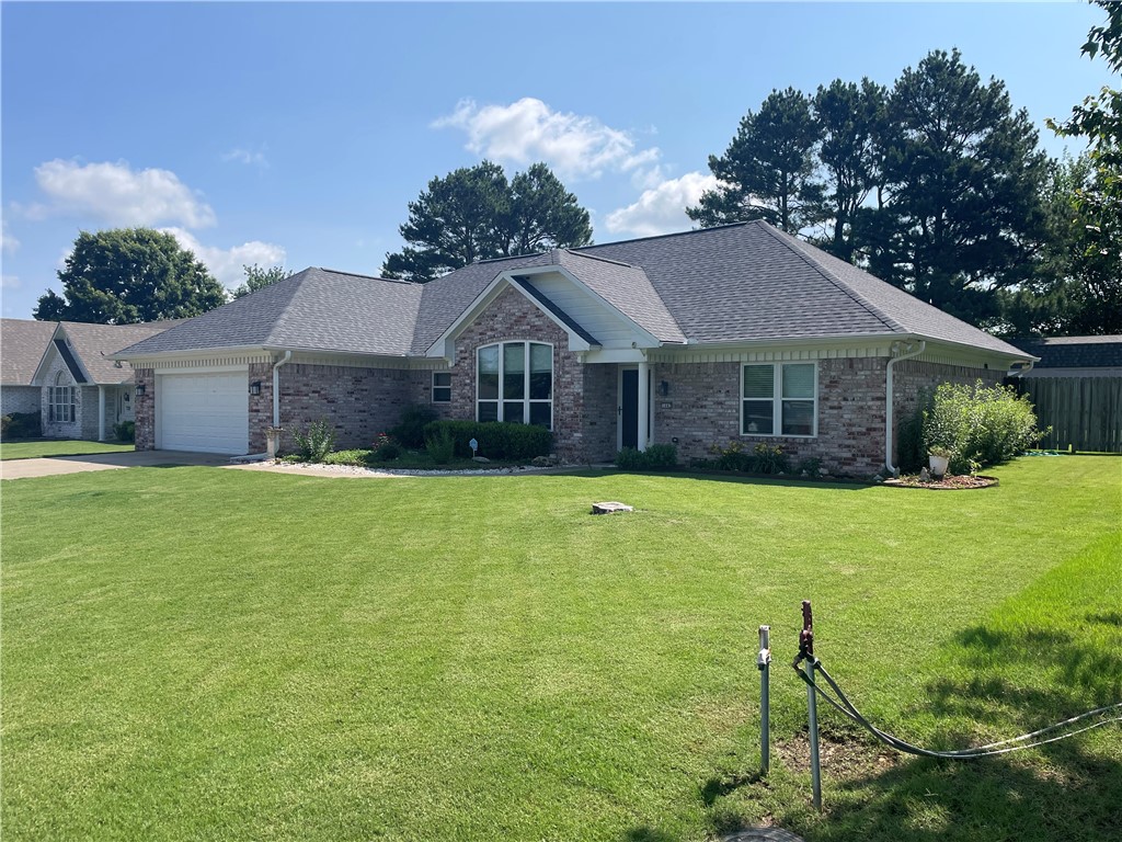 Great location in the heart of Springdale, newer roof, hvac, and water heater. Move in ready almost 1900 sf, 3br/2ba, located in quiet neighborhood with quick access to all NW Arkansas has to offer. Storage building out back with lots of room, complete with heat, air, and insulation. Brick gas log fireplace, covered back patio, you will not be disappointed. Chef style oven with gas cooktop, large laundry room, master bedroom suite complete with walk-in closets. Oversized 2-car garage with side door entry and extra storage in back, epoxy floor just put in as a plus. More house than you would expect with added features for the price.