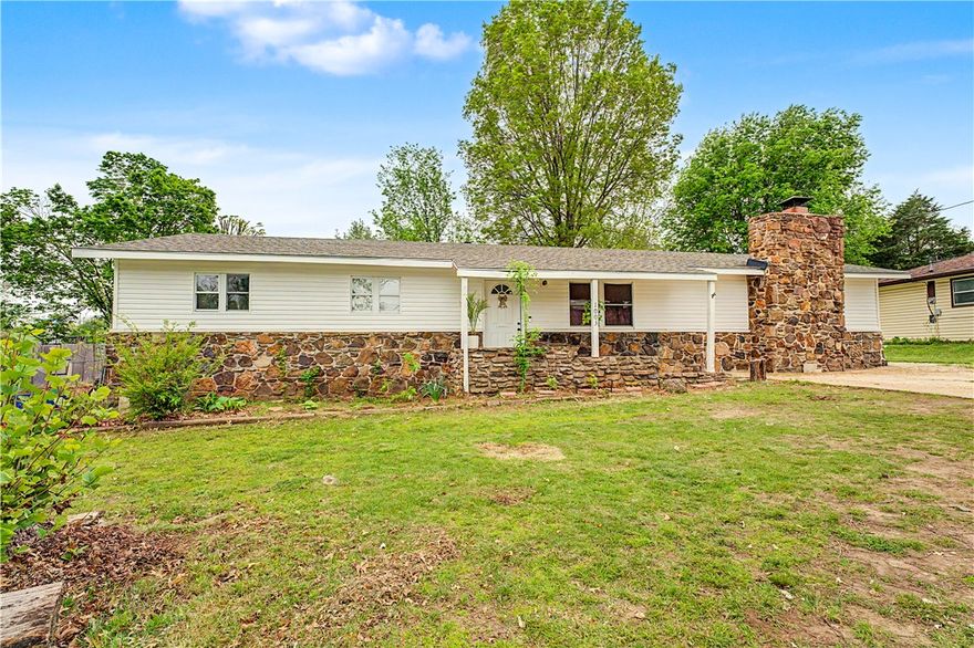 This charming home offers a prime location just minutes from downtown, giving you easy access to local dining, shopping, and entertainment.  Enjoy a functional layout with comfortable living spaces and plenty of natural light throughout. The spacious yard offers room to relax, entertain, or create your own outdoor retreat. With its convenient location near schools, parks, and the vibrant downtown square, this home combines comfort and accessibility. Don’t miss your chance to make this Bentonville gem your own!