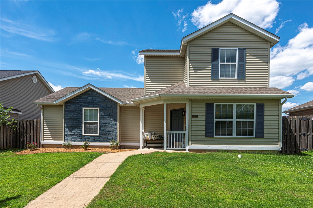 HOME SWEET HOME! This recently updated 2 bedroom 2.5 bath home is located minutes away from schools, shopping, parks, eateries, I-49, and the University of Arkansas campus! With exterior updates including soft blue accents and new front landscaping this home is just what you have been waiting for! From the covered front porch head inside to the open concept living space featuring all new vinyl plank flooring and updated U-Shaped kitchen with marble print counters, updated textured backsplash, stainless steel appliances (Refrigerator included!), updated lighting brass sink faucet & cabinet hardware, and a counter height peninsula with room for additional seating + updated half bath downstairs! Upstairs youāll find 2 large bedrooms and 2 full bathrooms complete with updated vanities, mirror and light fixtures! Donāt miss out on this opportunity! Inquire today!