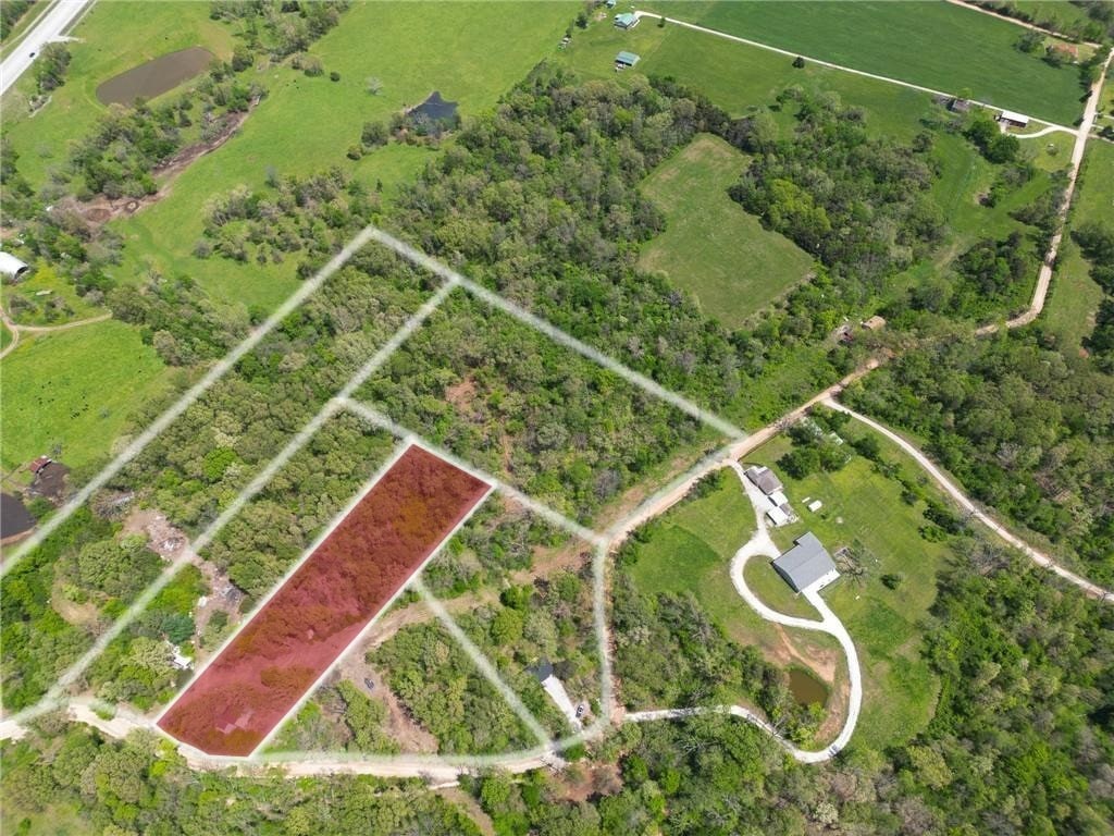 Hard-to-find 3-acre parcel in a great location—right off Boundary Line Road in Garfield. Whether you're looking to build, invest, or create a weekend getaway, this property offers flexibility and space. Mobile home or tiny home? Absolutely. Want a mini farm? This is it! Easy access, a mix of open and wooded areas, and plenty of potential to make it your own. Rural Water available at the street. Just the right size for privacy without the upkeep of a larger tract.