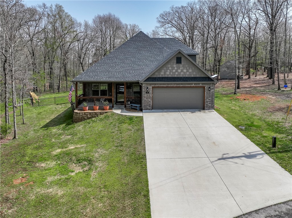 Hard to find FLAT, double lot in Bella Vista! Welcome to 6 Gretna Green Ln ā built in 2021 and nestled on a rare, flat double lot totaling 0.66 acres. This 3-bed, 2.5-bath home sits on a peaceful cul de sac surrounded by mature trees, offering the privacy and quiet you desire in Bella Vista. Fenced backyard perfect for relaxing, entertaining, and gardening. 10x12 storage shed & chicken coop convey! Enjoy all of Bella Vistaās outdoor amenities: mountain biking, trails, lakes, golfing, etc ā right at your doorstep. Only 3 minutes from the amazing Branchwood Recreation Center and less than 10 minutes to the Lakepointe Restaurant & K9 Corral Dog Park! Scotsdale and Highlands Golf courses nearby and just 7 minutes to I-49, youāre perfectly located for easy access to Bentonville, Centerton, or even a quick trip to Missouri! Come see this one today!