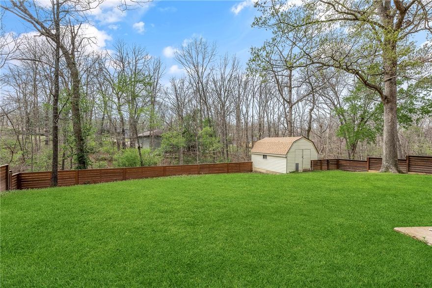 This 3-bedroom, 2-bath home sits just 3 miles from Hwy 71 and offers easy access to lakes, golf, bike trails, and the Bella Vista Country Club. Enjoy recent upgrades, including bamboo-engineered wood flooring, wood-like tile in bathrooms, remodeled baths, Anderson windows & storm doors (2 years old), and a newer roof, 3 years old.
Relax in the sunroom and unwind in the indoor sauna & hot tub, and take advantage of three outbuildings for storage or hobbies. With an electric heat pump and a peaceful location near Tanyard Creek, this home is a must-see! All appliances convey. (2 bedroom septic)
