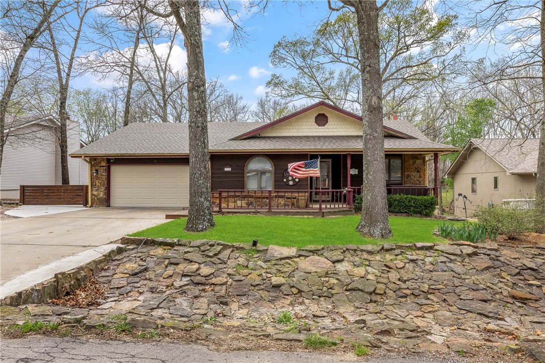 This 3-bedroom, 2-bath home sits just 3 miles from Hwy 71 and offers easy access to lakes, golf, bike trails, and the Bella Vista Country Club. Enjoy recent upgrades, including bamboo-engineered wood flooring, wood-like tile in bathrooms, remodeled baths, Anderson windows & storm doors (2 years old), and a newer roof, 3 years old.
Relax in the sunroom and unwind in the indoor sauna & hot tub, and take advantage of three outbuildings for storage or hobbies. With an electric heat pump and a peaceful location near Tanyard Creek, this home is a must-see! All appliances convey. (2 bedroom septic)