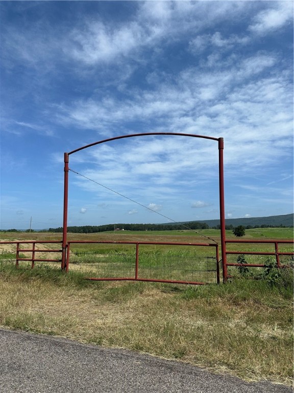 Discover the rare beauty of this breathtaking 28 acre +/- tract of rolling pastureland, framed by sweeping mountain vistas and ideal for livestock, farming, or building your dream homestead. This fully fenced property features fertile hay fields, open pastures, and a tranquil pond nestled in the gentle landscape. There are multiple potential building sites that capture the panoramic views of the surrounding hills. Whether you're seeking serenity, a working farm, or private retreat, this piece of countryside offers endless potential.