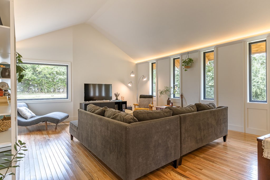 Architecturally designed home on a large lot in South Fayetteville. Offering privacy and a sense of seclusion, yet only minutes from dining, shopping, and the University. The 2,100 sq. ft. layout includes 3 bedrooms and 2 bathrooms, highlighted by a spacious primary suite. Originally built in 1961, the home has just undergone a complete transformation with a newly finished addition and full system upgradesānew HVAC, electrical, and plumbing. Custom cabinets, built-ins, wood flooring, and cedar siding are just a few of the design details that make this home stand out. Thoughtful details blend timeless character with modern convenience, creating a distinctive, high-quality home that is ready for everyday living and lasting enjoyment.