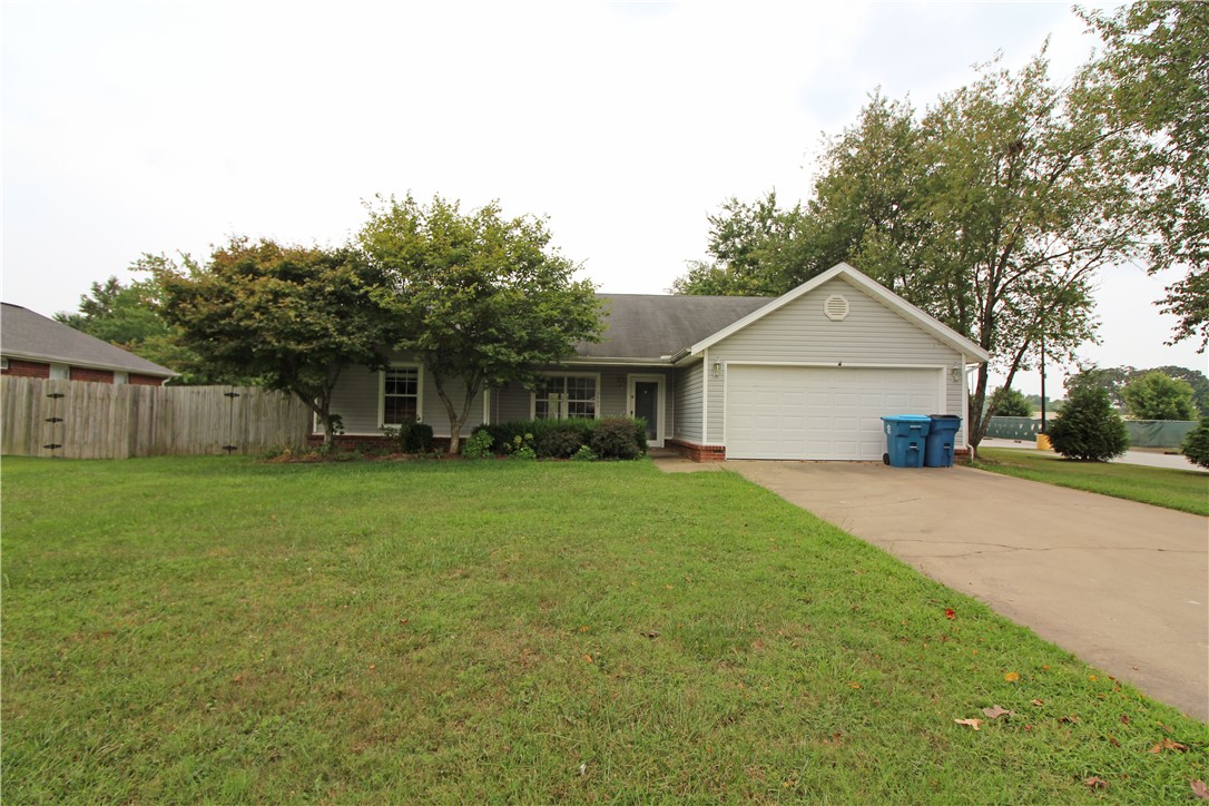 Walking distance to Memorial Park & 1-2 minute walk to ISD building. 3 bedroom 2 bath home with large privacy fenced yard and covered porch. Eat in kitchen, granite countertops, wood look flooring and tile in throughout. No carpet! 2 car garage. Occupied. 24 hr. showing