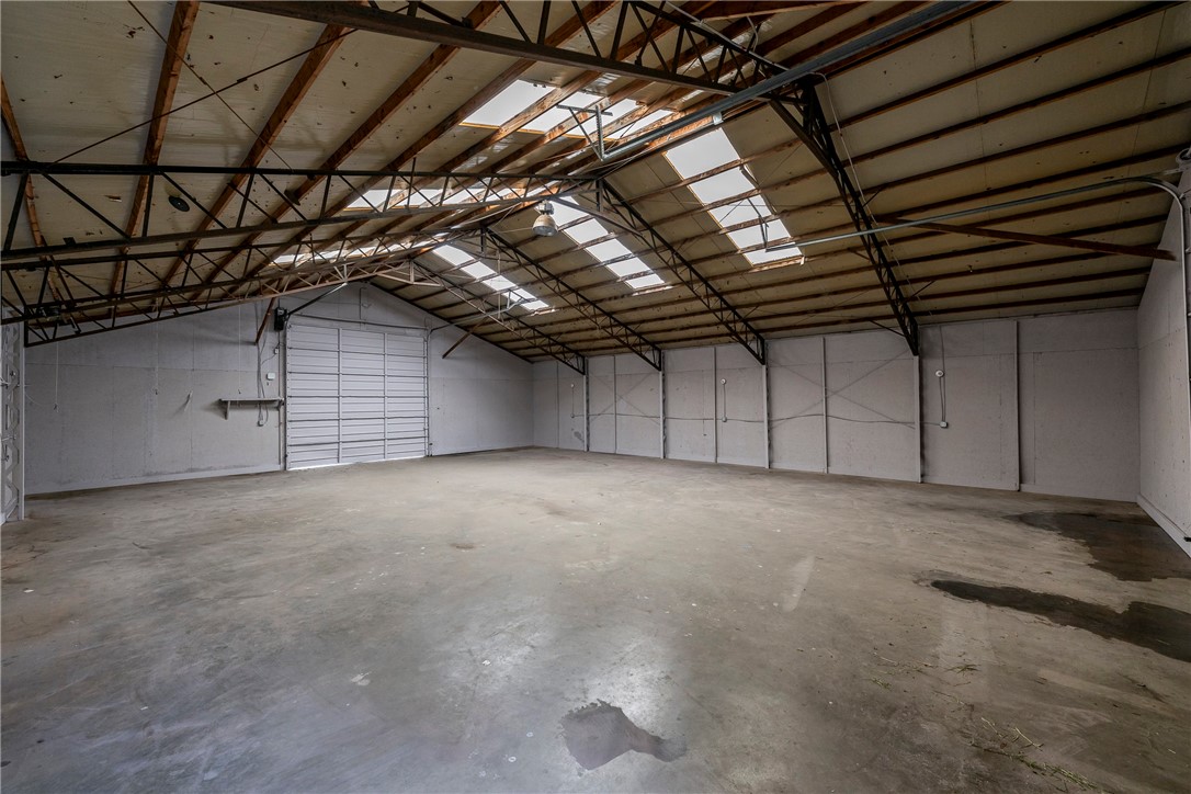 Prime commercial lease opportunity on E. Robinson with unbeatable visibility and right off of Hwy 412 East! This 2,000 SF warehouse is paired with secure fenced yard space, making it ideal for storage, distribution, or a wide range of business uses. The building is equipped with electricity, while water and sewer are available on site but not currently connected. Zoned C-2 commercial, this property offers flexibility and room to grow. Tenants are responsible for verifying requirements with the City of Springdale for their intended use. Attached documents for zoning. Front concrete pad area could also be for lease, inquire if interested.