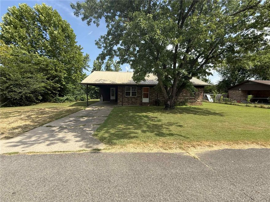 Welcome to 1803 E Harkey ST, a single-family residence in Paris, Arkansas, built in 1980. The metal roof provides  years of service. This property offers a unique opportunity to create your ideal living space on a manageable .27 acre lot. With three well-proportioned bedrooms and a large bathroom with tiled step in shower. This home has an open kitchen, dining, and living area. It presents a canvas for personalized living.