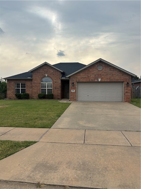 East facing full brick home just 10 minutes from Walmart Home Office. Large living room, granite counter tops, solid surface flooring throughout, and a fully fenced yard. Washer, dryer, & fridge are included. Get it before it's gone! Available October 1, 2025.