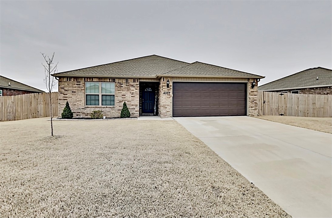 Great home in Bentonville's Providence Village! You truly cannot beat this ENORMOUS, fenced, flat back yard. Pulling up you will like the curb appeal of this NE facing home. From the moment you step inside you will fall in love with this bright, open layout. This smart floor plan has the master in the back of the house with the other bedrooms towards the front. Large kitchen with lots of light and tons counter space. Eat-in kitchen for your dining needs. Walk out back to a covered patio and huge yard. Such an amazing Bentonville home at a fabulous price! Make it yours today!